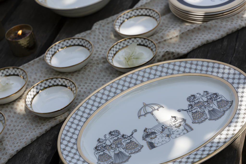 Kaunteya Byah Premium Oval Platter- Lightweight, fine bone china, tableware, luxury oval platter, 24K gold plated, Phad art, beautiful white, black and gold crockery with intricate black and gold wedding design.